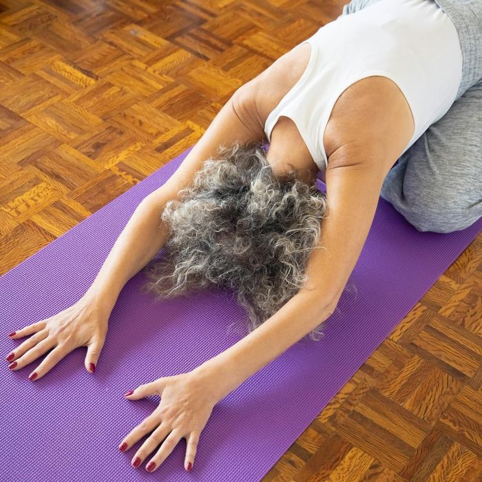 Person meditating in a serene environment, symbolizing mental and physical balance.